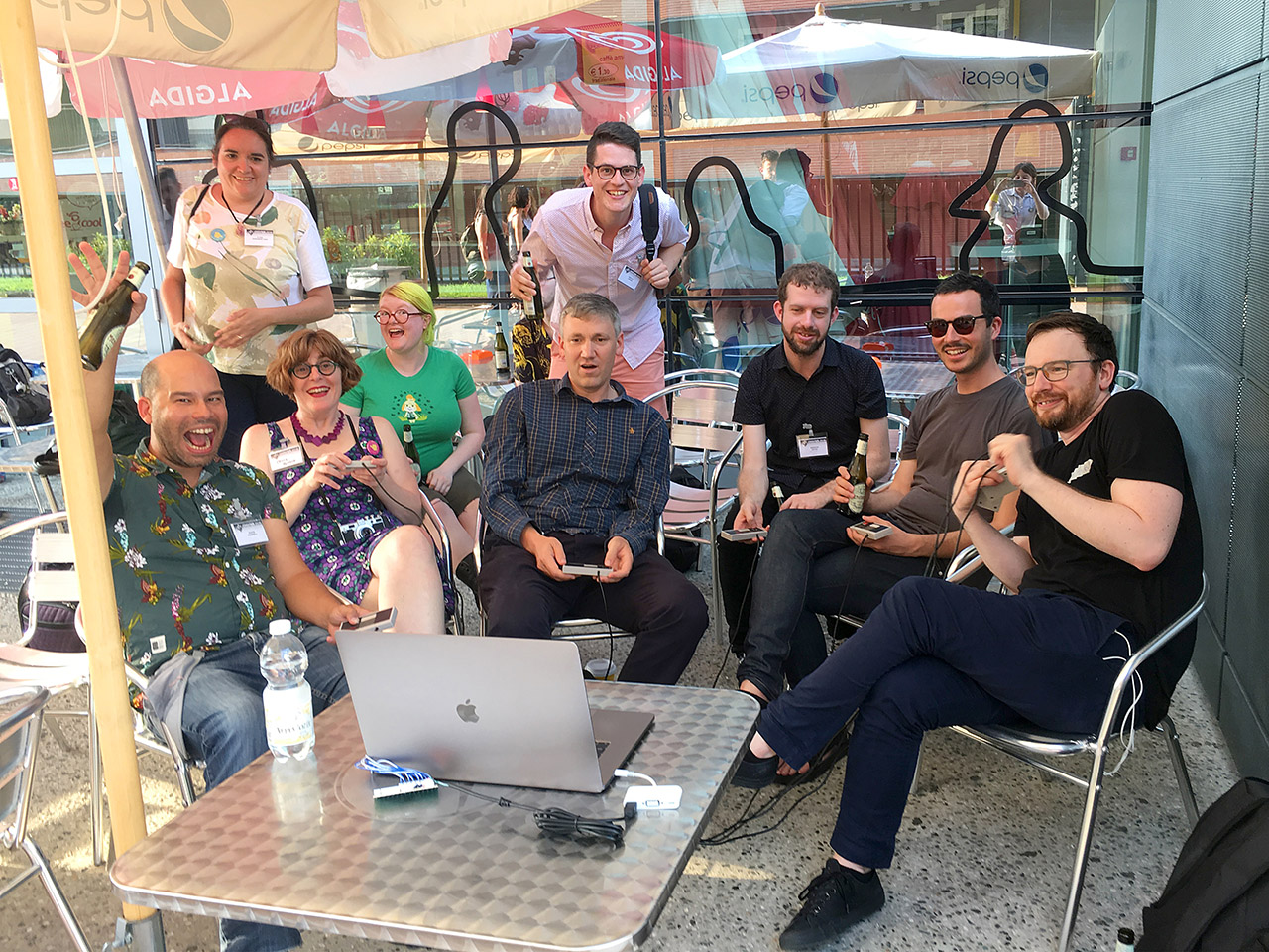 People playing the Octopad together in a bar for alt.ctrl.party at GDC 2018.